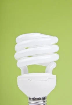 Bulb on green background Stock Photos