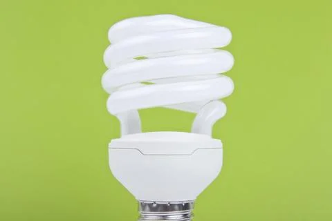 Bulb on green background Stock Photos