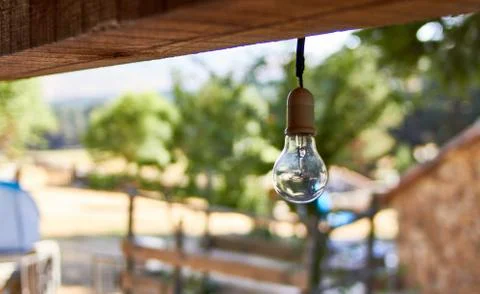 Bulb hangs from the cabin ceiling Stock Photos