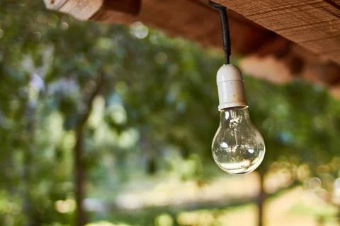 Bulb hangs from the cabin ceiling Stock Photos