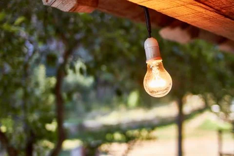 Bulb hangs from the cabin ceiling Stock Photos