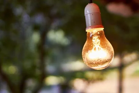Bulb hangs from the cabin ceiling Stock Photos