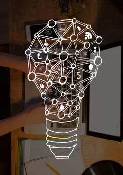 Bulb icon against person using a computer photo Stock Photos