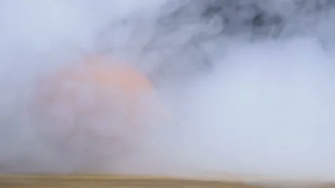 Bulb onion is on the table and smoke or steam blows from the side in slowmo Video stock 102387659