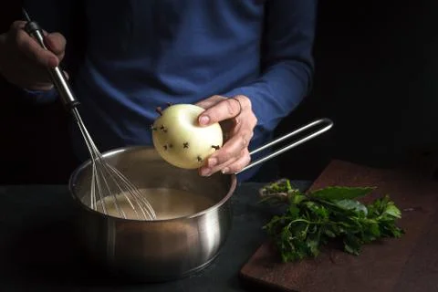 Bulb is placed in a base sauce for bechamel Stock Photos