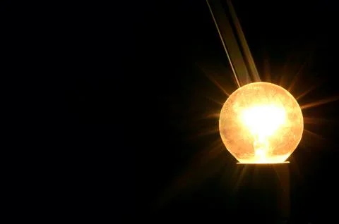 Bulb shines Stock Photos