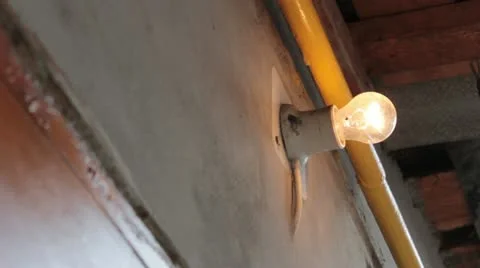 Bulb turns on and off Stock Footage