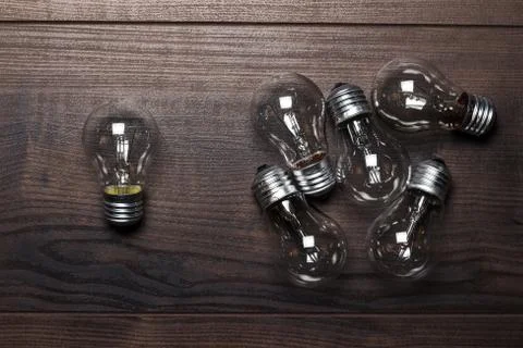 Bulbs out of the crowd concept Stock Photos