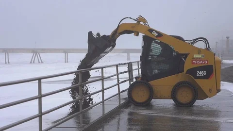 Buldozer working on the beach 스톡 동영상 112954299