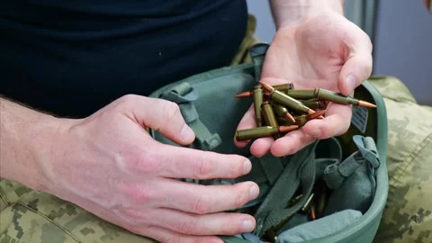 Buletts in arms Stock Footage 255460070