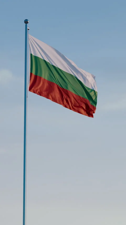 Bulgaria, Sofia: Cinematic Vertical Waving National Flag Against Blue Sky 스톡 동영상 321801649