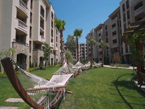 Bulgaria, view of the courtyard from the hotel. Hammocks. Stock Footage