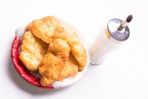 Bulgarian breakfast, fried dough with sugar - Mekitsi Stock Photos