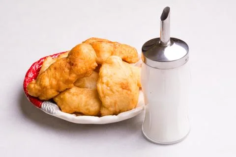 Bulgarian breakfast, fried dough with sugar - Mekitsi Stock Photos