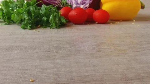 Bulgarian pepper slices drops on the table slow motion Stock Footage 79423802