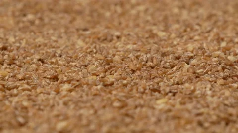 Bulgur - background. Bulgur, side view. Cereals, close-up. Video stock 144685940