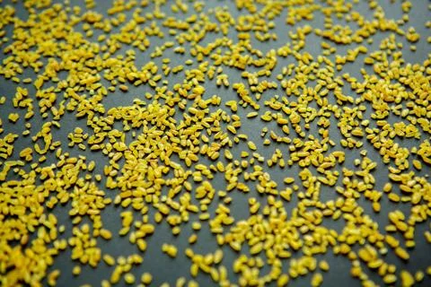 Bulgur, cereals pattern on a black background Stock Photos