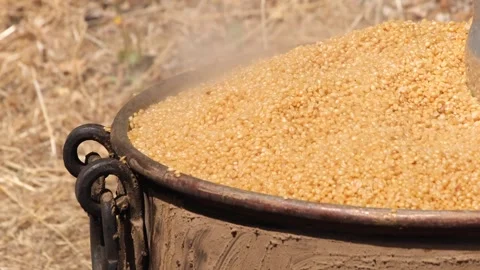 Bulgur is cooking in cauldrons 3 Stock Footage 294037434