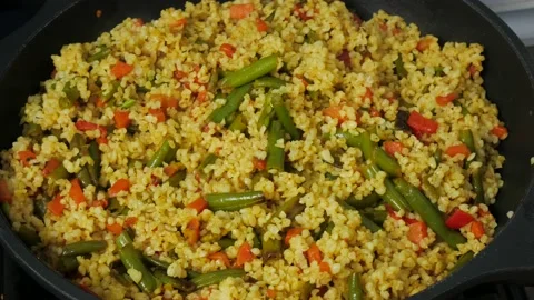 Bulgur dish: Pilaf from bulgur. Vegetarian dish. Stock Footage 91663276