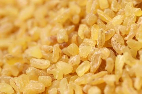 Bulgur grains background Stock Photos
