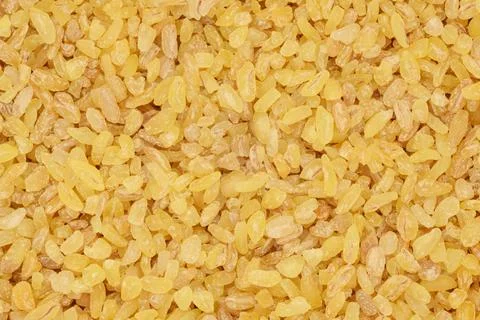 Bulgur grains background Stock Photos