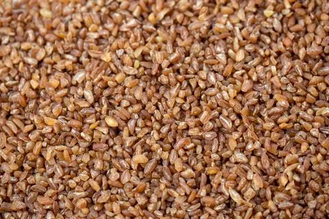 Bulgur wheat background Stock Photos