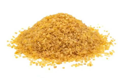 Bulgur wheat isolate. A hill of bulgur grains on a white background Stock Photos