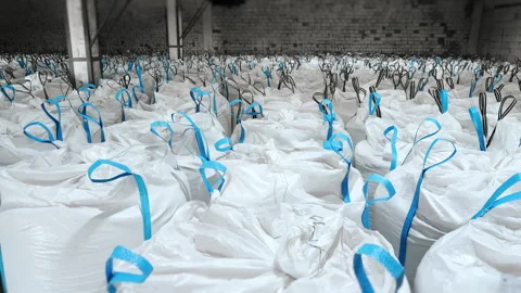Bulk Bags Stored in Rows Inside Industrial Warehouse. Видео 345034980