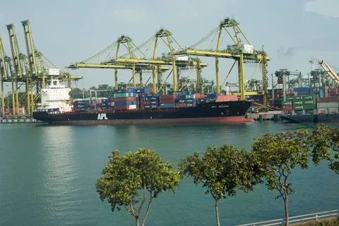 Bulk cargo ship under port crane bridge, Odessa, Ukraine Stock Photos