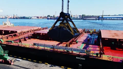 Bulk Carrier Cargo Loading - Clamshell Grab Working At Industrial Port Stock Footage 344079167