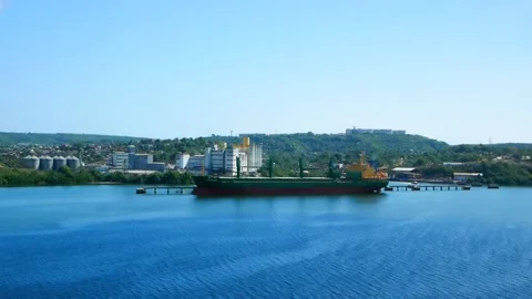 Bulk carrier loading by some cargo at port Santiago de Cuba. Stock Footage 159673737
