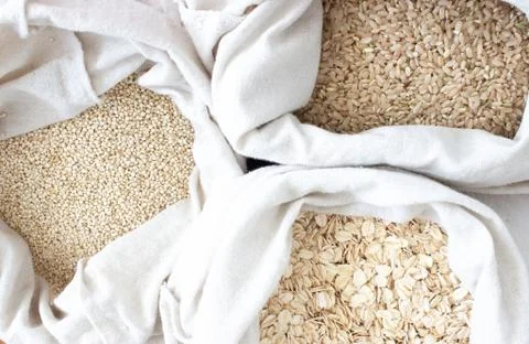 Bulk grains and cereal in reusable cotton bags Stock Photos