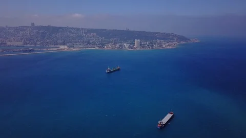 Bulk ship sails on open water  - aerial 4k view Stock Footage 110400944