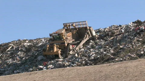 Bull Dozer trash dump M HD Stock Footage 339859
