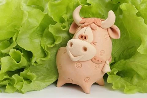 A bull is in greenery. Stock Photos