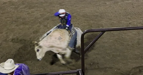 Bull riding rodeo Stetson Wright slow motion 4K Stock Footage 212979395