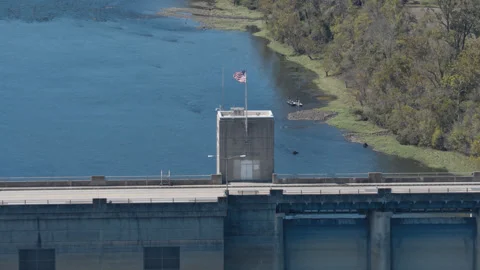 Bull Shoals Dam Control Tower Above Reservoir and Wooded Arkansas Shore Stock Footage 344214866