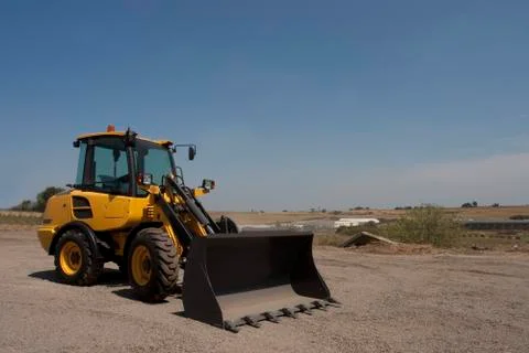Bulldozer in action in the quarry Stock Photos