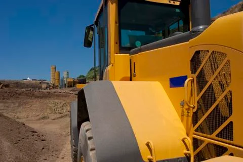 Bulldozer in action in the quarry Stock Photos