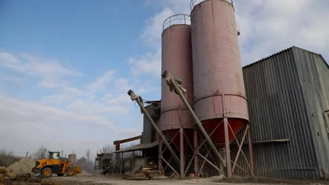 Bulldozer on the background of the factory Stock Footage 203851435