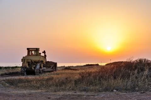 Bulldozer on the beach Stock Photos