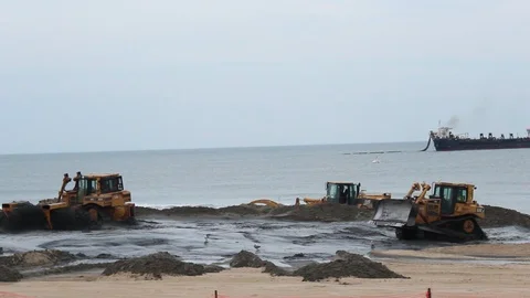 Bulldozer Construction On Beach Maintenance Video stock 106674152