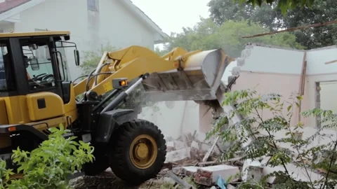 Bulldozer demolishing house 03 Stock Footage