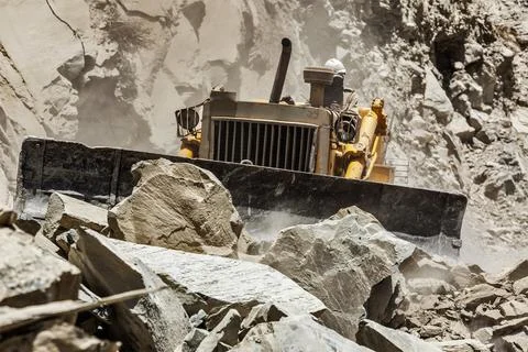 Bulldozer doing mountain road construction in Himalayas Himachal Pradesh India Stock Photos