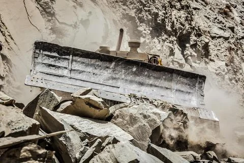Bulldozer doing mountain road construction in Himalayas Himachal Pradesh India Stock Photos