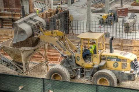Bulldozer Dumping Rocks Stock Photos