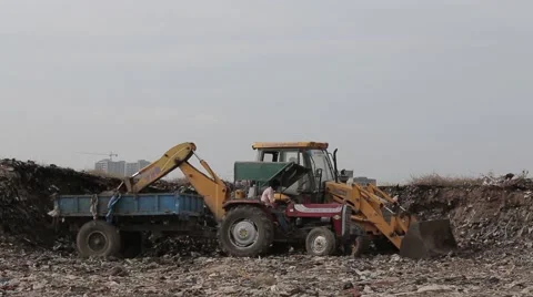 Bulldozer Garbage Dumping India 2 Stock-Footage 55441395