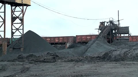 Bulldozer leveled coal pile Stock Footage 70885685