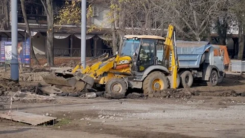 Bulldozer levels the ground level front bucket Stock Footage 82926528