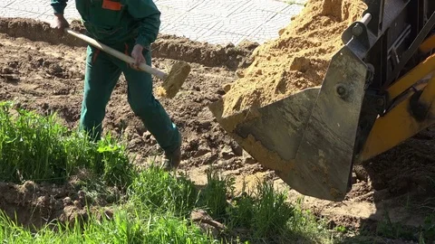 Bulldozer loader excavator construction machine and worker, close up 動画素材 74972850